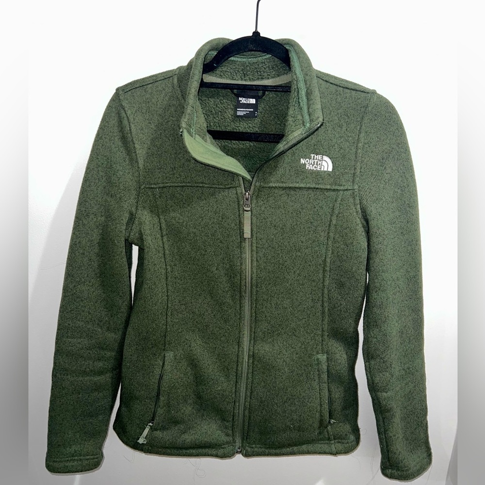 Green zip-up The North Face jacket